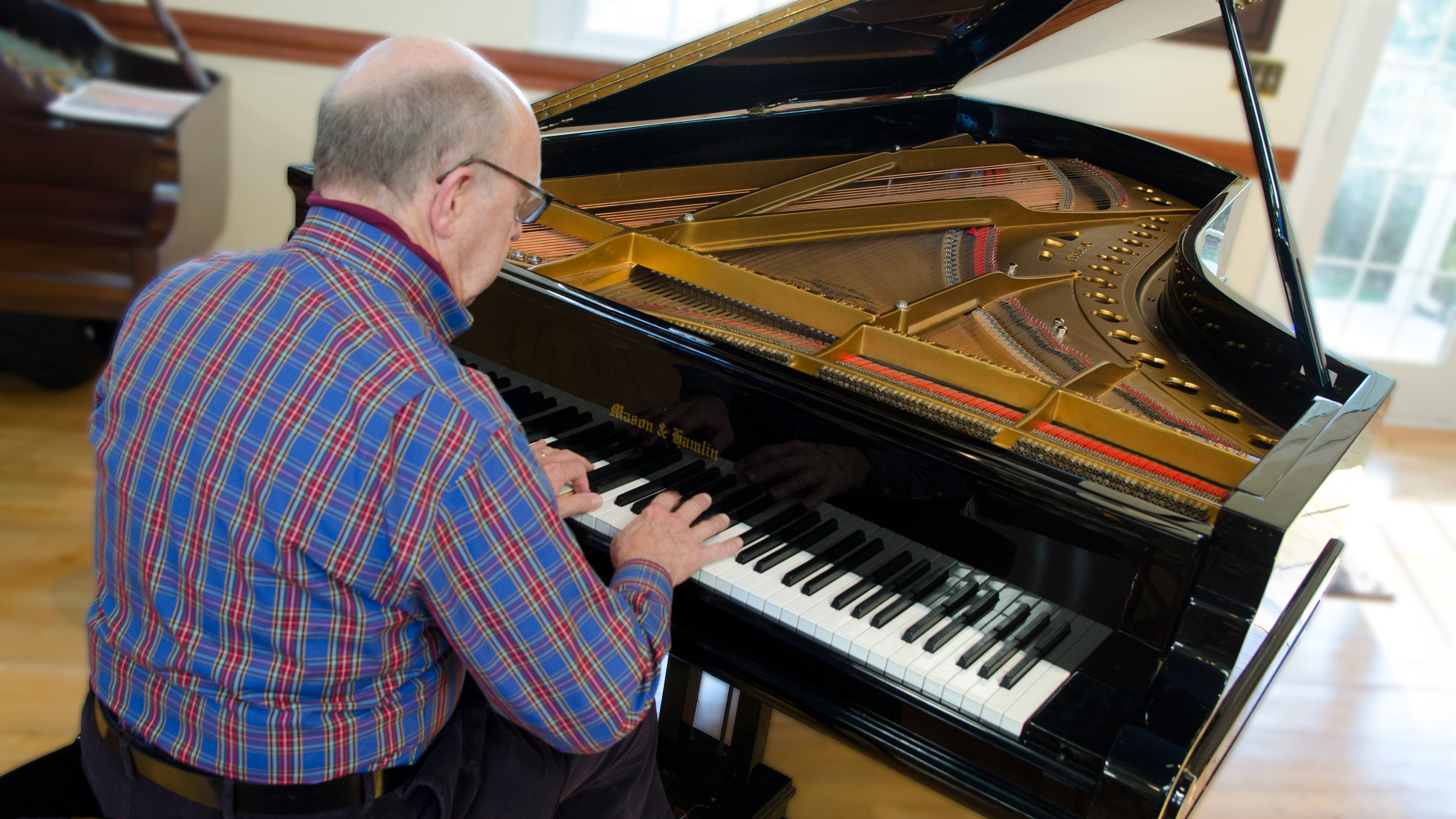 Geoffrey Simon plays takes the concert-grande piano for a test drive