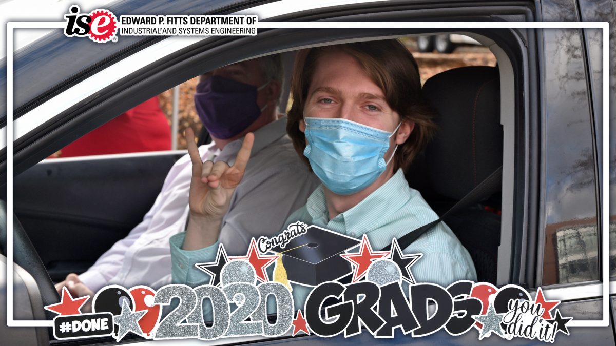 Students in their car with a 2020 Grads filter over top.