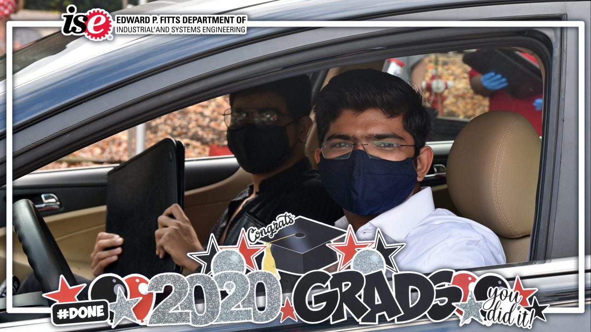 Students in their car with a 2020 Grads filter over top.