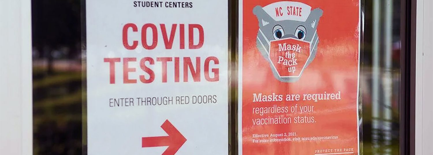 COVID testing signs on NC State's campus