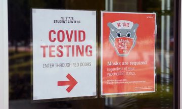 COVID testing signs on NC State's campus