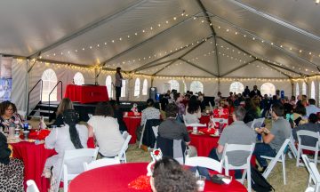 A tent full of people at the 2022 C.A. Anderson Awards