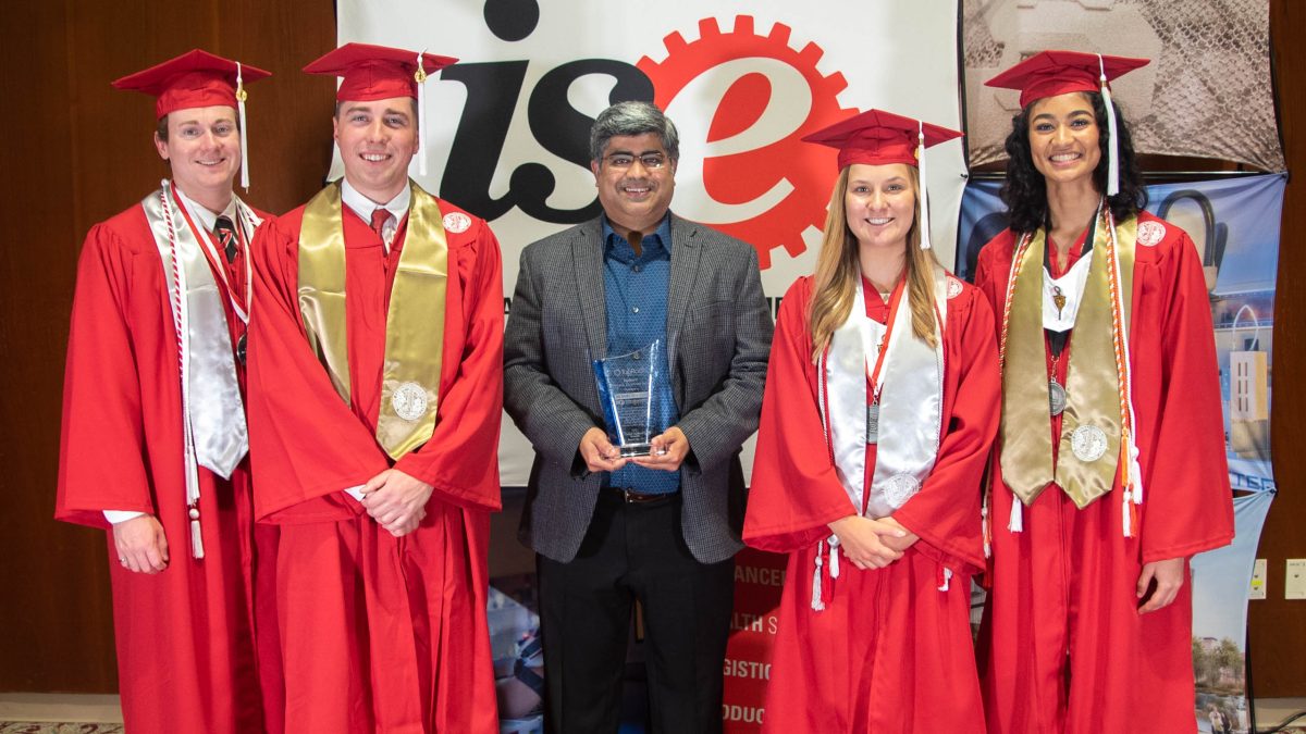 ISE students with faculty at the reception | NC State ISE Spring 2022 Commencement Ceremony