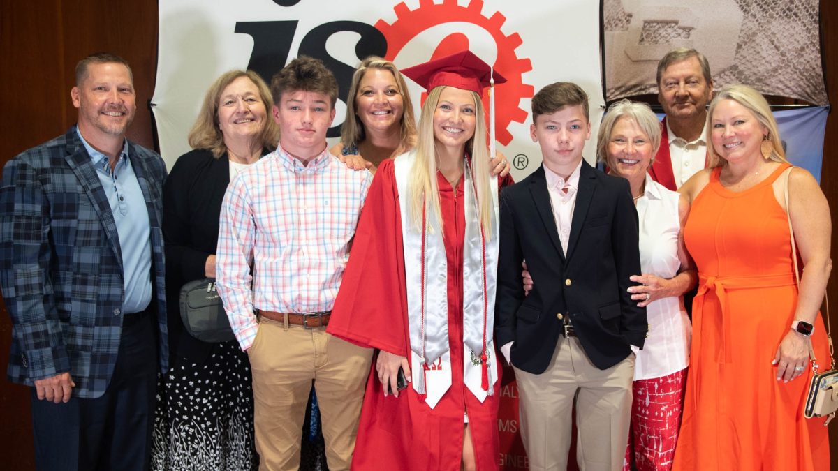 ISE students with family at the reception | NC State ISE Spring 2022 Commencement Ceremony