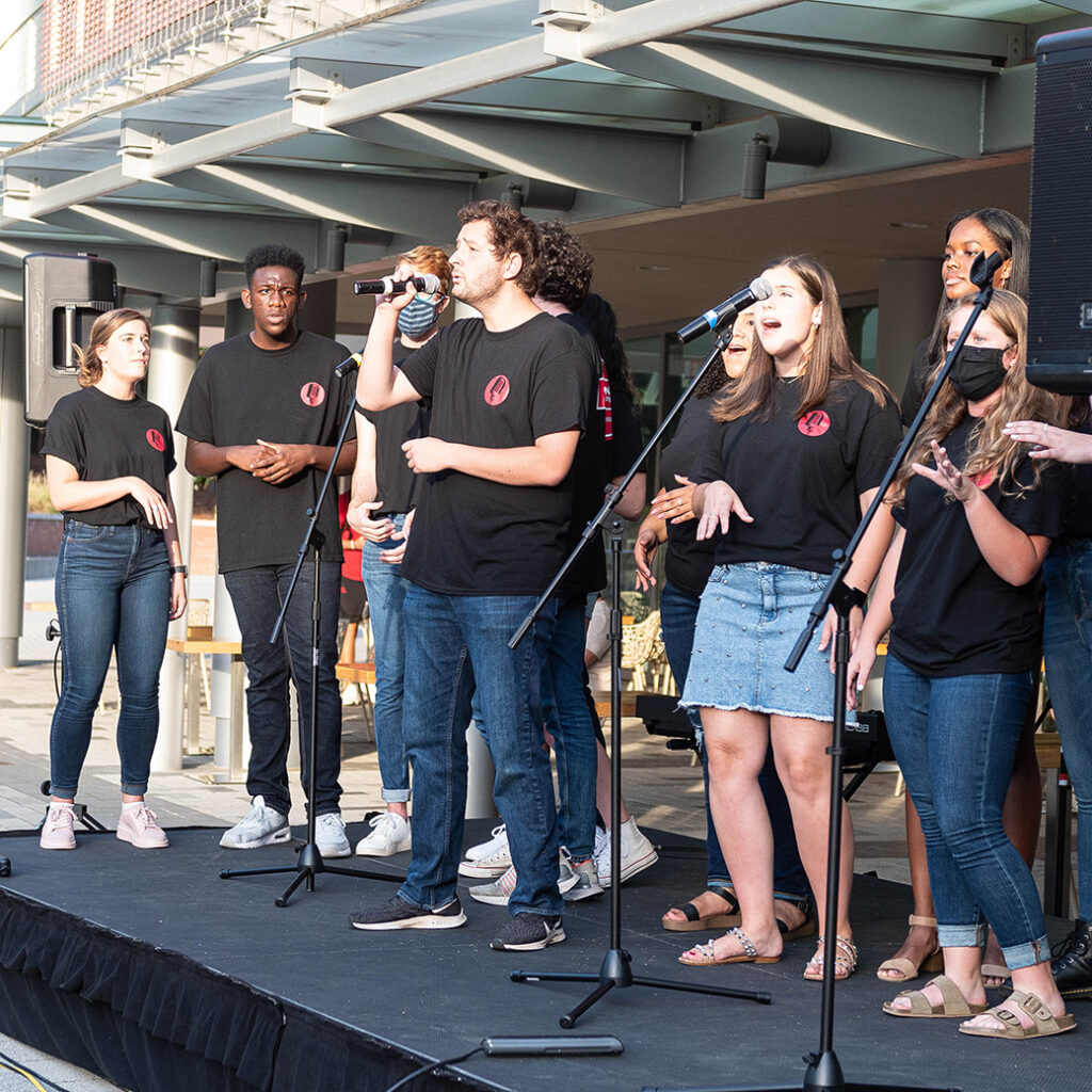 Members of Chordination A Cappella perform on Stafford Commons during the All Music Showcase on Aug. 26, 2021.
