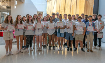 All of the summer campers posing with their certificates