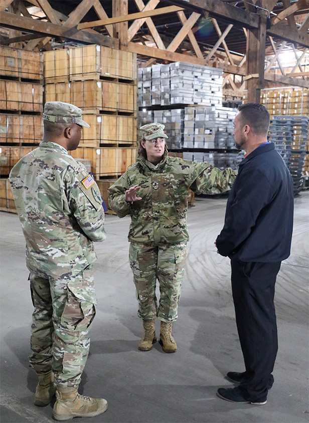 Maj. Gen. Michelle Rose explaining logistical issues with fellow soldiers